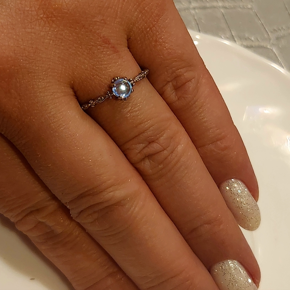 Real Sterling Silver 925. Aquamarine stone .New  Elegant design. Size 7.0
